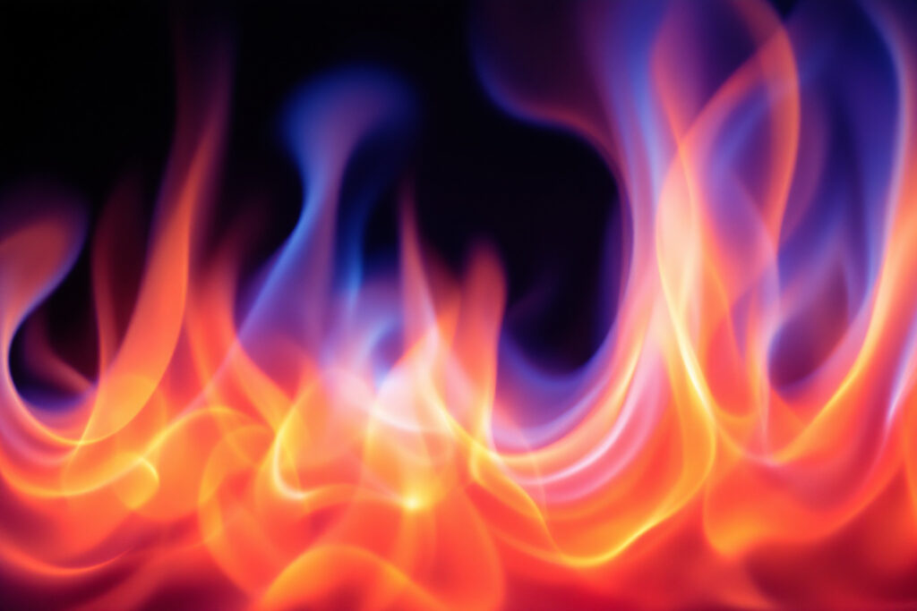 An educational infographic on Combustion and Burning featuring: Combustion Reaction: Chemical equation (Fuel + O₂ → CO₂ + H₂O + Heat) with labeled reactants/products Types of Combustion: Rapid (fire), Spontaneous (coal), Explosion (fireworks) with examples Fire Triangle: Visual of heat, fuel, oxygen components for sustaining fire.